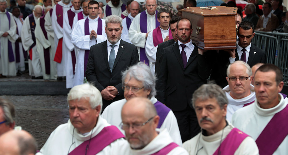 Thousands in France Attend Funeral of Priest Killed by Extremists in Normandy