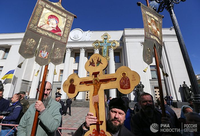UKRAINIAN PARLIAMENT ANNOUNCES IT WILL NOT CONSIDER ANTI-ORTHODOX BILLS AS THOUSANDS PROTEST OUTSIDE