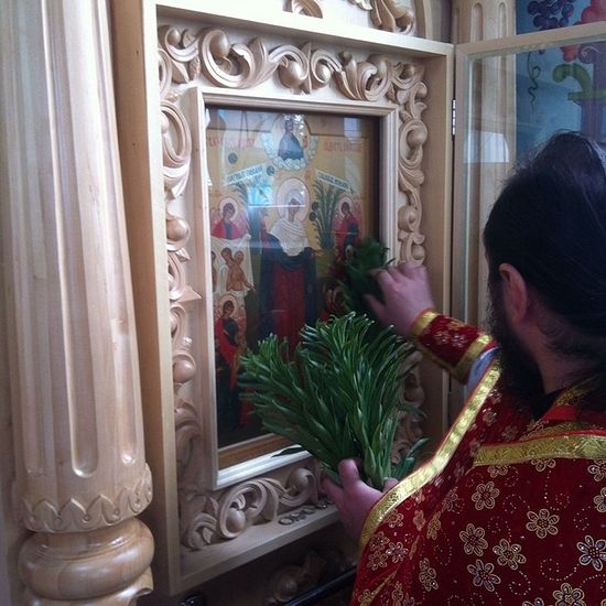 WITHERED LILIES BLOOM NEAR A WONDERWORKING ICON OF THE MOTHER OF GOD
