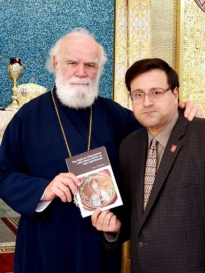 Book on Christian Stewardship by OCP Delegate Dr. John G. Panagiotou Presented to Met. Alexios of Atlanta