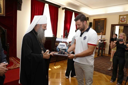 Patriarch Porfirije Presented With Water Polo Cap by the National Team of Serbia